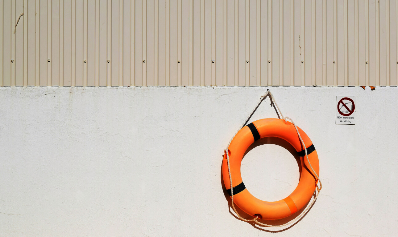 Image of a buoy hung on an outside wall